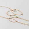 Long leaf lariat with white pearl necklace