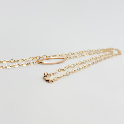 Long leaf lariat with white pearl necklace