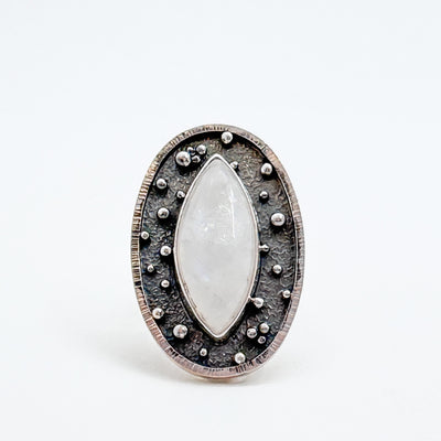 Orbit ring with moonstone