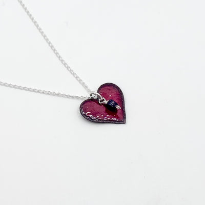 Enamel heart pendant with onyx heart necklace