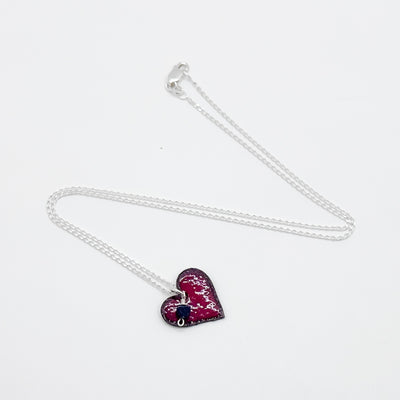 Enamel heart pendant with onyx heart necklace