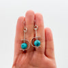 Turquoise pac-girl earrings