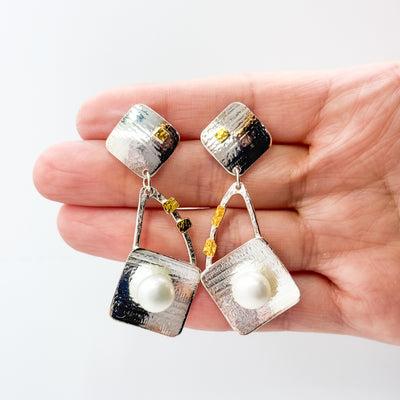 Pearl Power white button post earrings