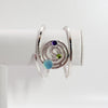 Spiral cuff with amethyst, peridot, & chalcedony