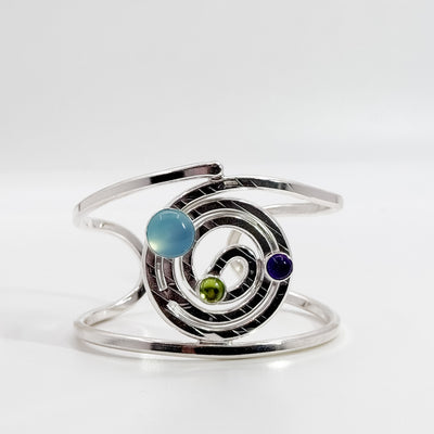 Spiral cuff with amethyst, peridot, & chalcedony