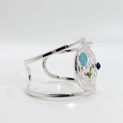 Spiral cuff with amethyst, peridot, & chalcedony