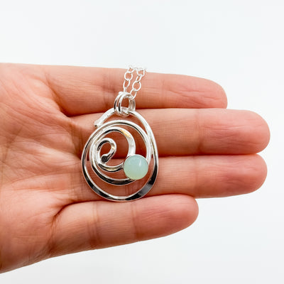 Domed spiral pendant with chalcedony